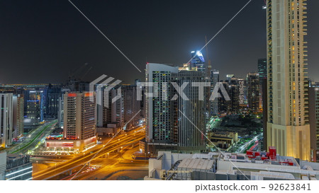 Skyscrapers at the Business Bay in Dubai aerial night timelapse, United Arab Emirates 92623841