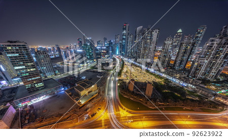Bay Avenue with modern towers residential development in Business Bay aerial panoramic night timelapse, Dubai Bay Avenue with modern towers residential development in Business Bay aerial panoramic night timelapse, Dubai 92623922