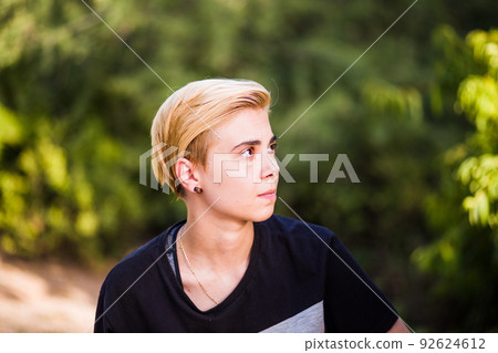 Tomboy androgynous lesbian non binary beauty in casual clothes gender lgtbi sex education. Sexual identity lesbian, homosexuality Tomboy androgynous lesbian non binary beauty in casual clothes gender lgtbi sex education. Sexual identity lesbian, homosexuality 92624612