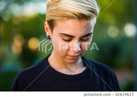 Tomboy androgynous lesbian non binary beauty in casual clothes gender lgtbi sex education. Sexual identity lesbian, homosexuality Tomboy androgynous lesbian non binary beauty in casual clothes gender lgtbi sex education. Sexual identity lesbian, homosexuality 92624623