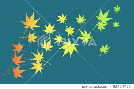 五顏六色的秋葉在綠藍色背景下翱翔的剪影 92624735