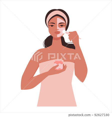 Girl Puts Beauty Mask on Face to Care for Skin Girl Puts Beauty Mask on Face to Care for Skin 92627180