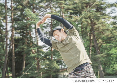A Japanese man who likes the outdoors in the forest (camping/leisure) A Japanese man who likes the outdoors in the forest (camping/leisure) 92629347