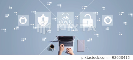 Virus and scam theme with person working with laptop 92630415