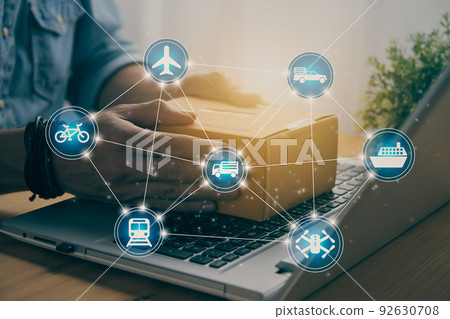 Hand of Casual Businessman Catch Parcel on Laptop and Blue Logistic Icon in Vintage Tone 92630708