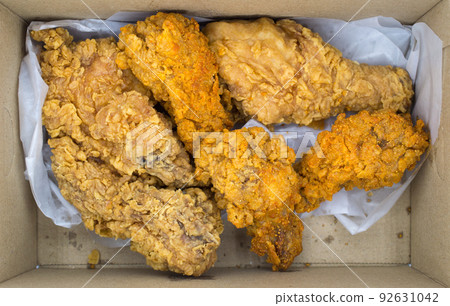 Top view of fried chicken filling in cardboard box. Top view of fried chicken filling in cardboard box. 92631042