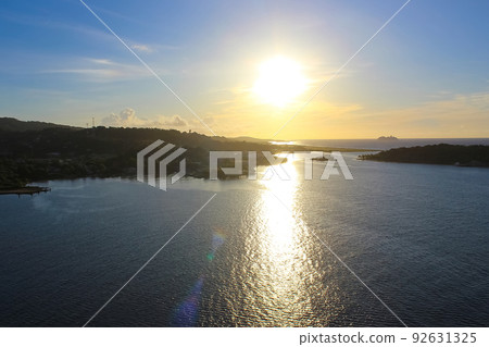 An aerial view of a tropical beach in Roatan Honduras early in the morning. An aerial view of a tropical beach in Roatan Honduras early in the morning. 92631325