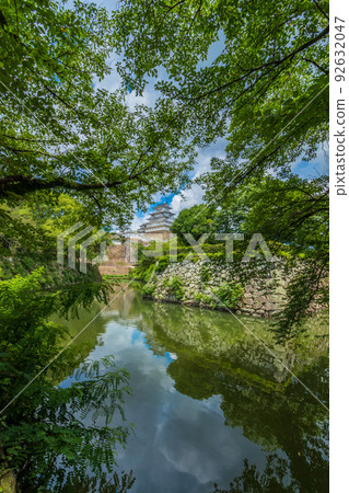 Himeji Castle and blue sky reflection Himeji Castle and blue sky reflection 92632047