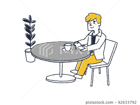 A man sitting at a table and reading quietly Scenery at a coffee shop or cafe 92633792