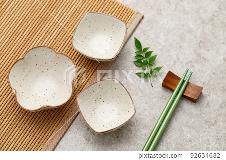 A table with Japanese dishes. Japanese food image. A table with Japanese dishes. Japanese food image. 92634682
