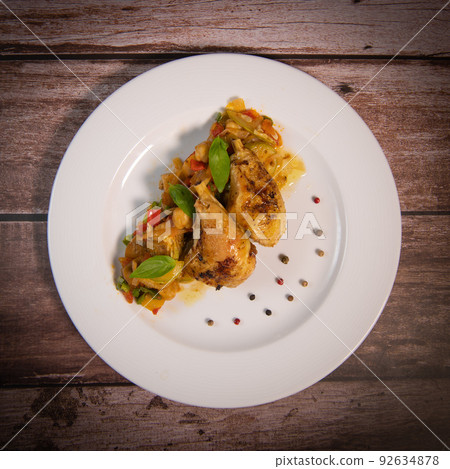 Recipe for grilled basquaise chicken with vegetables in ratatouille Recipe for grilled basquaise chicken with vegetables in ratatouille 92634878