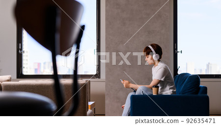 Headphones and women Headphones and women 92635471