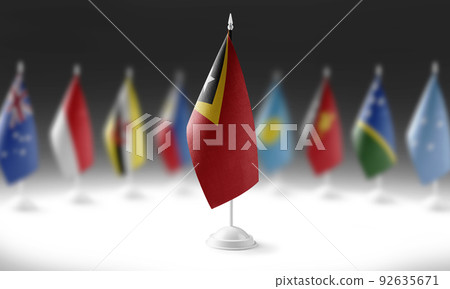 The national flag of the East Timor on the background of flags of other countries 92635671