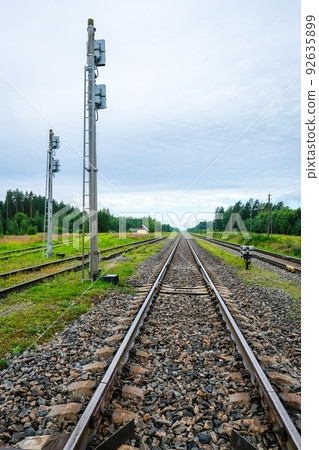 Rails, track, railway on dark day, close-ups. Railway junctions. Defocused 92635899