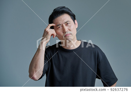 Men, 40s, 50s, middle-aged, black clothes, emotional expression Men, 40s, 50s, middle-aged, black clothes, emotional expression 92637276