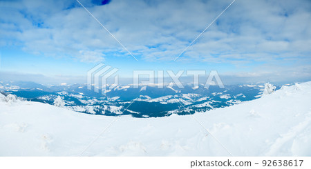 Carpathian mountains, Ukraine. Trees covered with hoarfrost and snow in winter mountains - Christmas snowy background 92638617