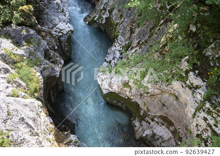 Top view of river soca flowing fast through big gorge 92639427