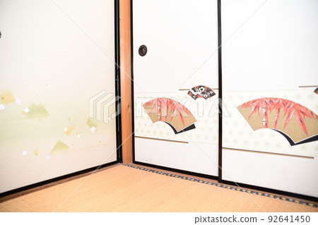 Fusuma painting of a fan pattern drawn on a fusuma of an old folk house 92641450