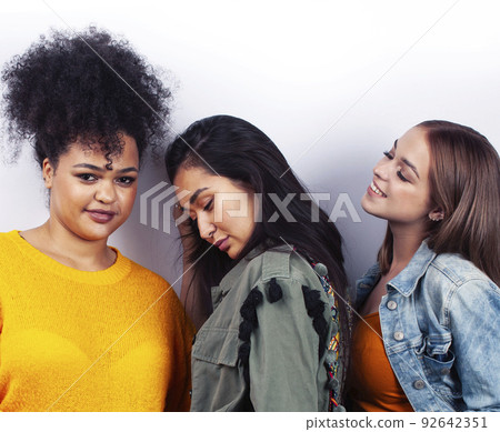 different nation woman: african-american, caucasian, asian together isolated on white background happy smiling, diverse type on skin, lifestyle people concept close up 92642351