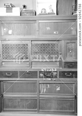 Black and white shot of a tea chest in an old private house 92642788