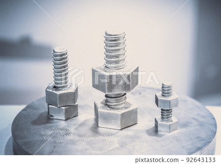 Object printed from metal powder on metal 3d printer.Object printed in laser sintering machine. Modern 3D printer printing from metal powder. Progressive additive DMLS, SLM, SLS 3d printing technology 92643133