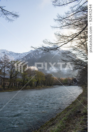 A beautiful view of Kamikochi in the early morning A beautiful view of Kamikochi in the early morning 92643244