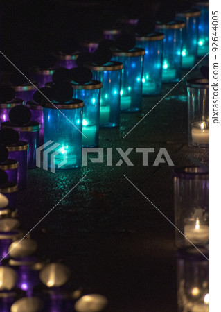 Beautiful event with many candles lit 92644005