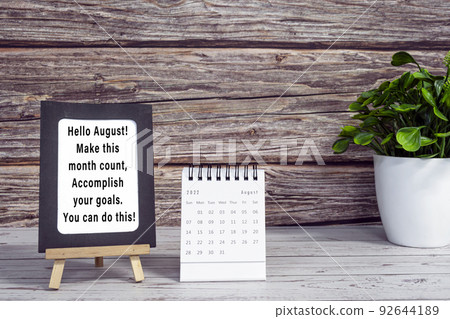 Motivational quotes on paper frame with August 2022 calendar. Motivational quotes on paper frame with August 2022 calendar. 92644189