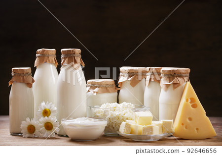 Dairy products. Bottles of milk, cheese, cottage cheese, yogurt, butter Dairy products. Bottles of milk, cheese, cottage cheese, yogurt, butter 92646656