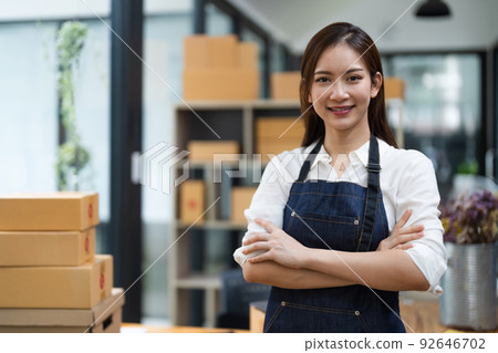 Portrait asian woman business owner with small business at home office. Portrait asian woman business owner with small business at home office. 92646702