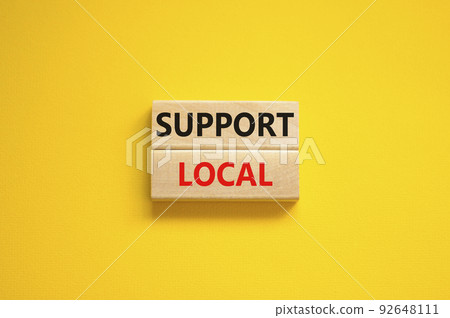 Time to support local symbol. Wooden blocks with words 'Support local'. Beautiful yellow background. Business and time to support local concept. Copy space. 92648111