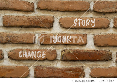 Change your story symbol. Concept words Change your story on red bricks on a beautiful brick wall background. Business, finacial and change your story concept. Copy space. 92648152