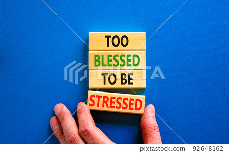 Too blessed to be stressed symbol. Concept words Too blessed to be stressed on wooden blocks. Beautiful blue table blue background. Psychological and too blessed to be stressed concept. Copy space. 92648162
