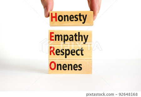 HERO honesty empathy respect oneness symbol. Concept words HERO honesty empathy respect oneness on blocks on beautiful white background. HERO honesty empathy respect open-mindedness concept. HERO honesty empathy respect oneness symbol. Concept words HERO honesty empathy respect oneness on blocks on beautiful white background. HERO honesty empathy respect open-mindedness concept. 92648168