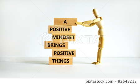 Positive mindset symbol. Wood blocks with words A positive mindset brings positive results. Beautiful white background Businessman model. Business motivational positive mindset concept. Copy space. 92648212
