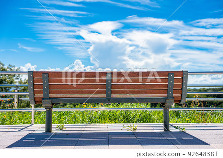 Summer scenery Blue sky and benches Summer scenery Blue sky and benches 92648381