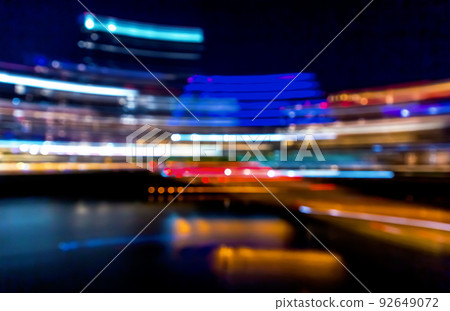 Abstract city night lights blurred urban background Abstract city night lights blurred urban background 92649072