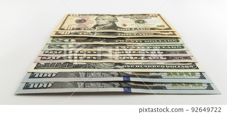 US american dollar money bills spread on white background US american dollar money bills spread on white background 92649722
