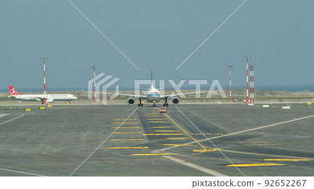 Plane taxiing to arrival gate at new Istanbul airport, Istanbul Havalimani in Turkey 92652267