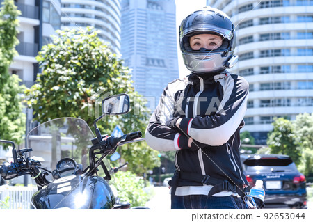 Female rider touring in Yokohama 92653044