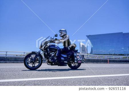Female rider touring Yokohama 92655116