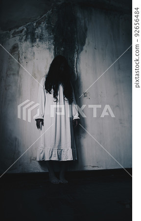 Horror woman ghost zombie creepy standing in haunted house 92656484