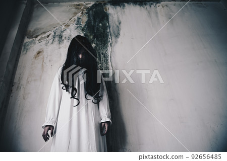 Horror woman ghost zombie creepy standing in haunted house Horror woman ghost zombie creepy standing in haunted house 92656485