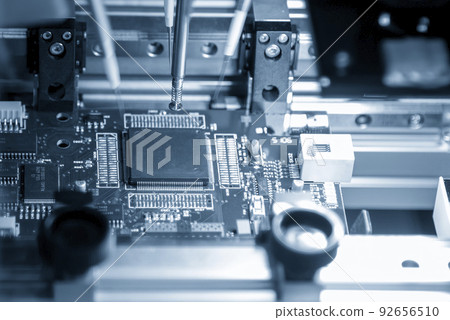 Close up scene the automatic assembly line of the main board by high speed robotic system. Close up scene the automatic assembly line of the main board by high speed robotic system. 92656510