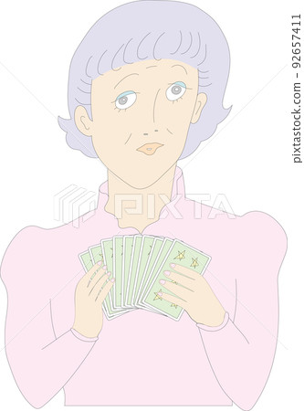 A woman holding a card 92657411