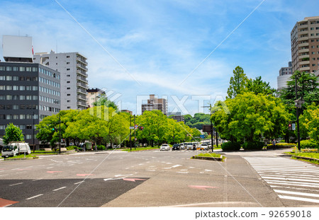 This is the Tanaka-cho intersection scenery of Peace Boulevard and Ekimae-dori. Looking towards Tsurumi Bridge. Please enjoy the city scenery full of greenery. Hiroshima 92659018