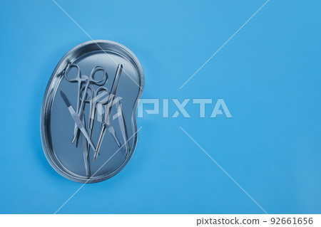 surgical equipment at surgery desk. Medical tools such scissors, scalpel. surgical equipment at surgery desk. Medical tools such scissors, scalpel. 92661656