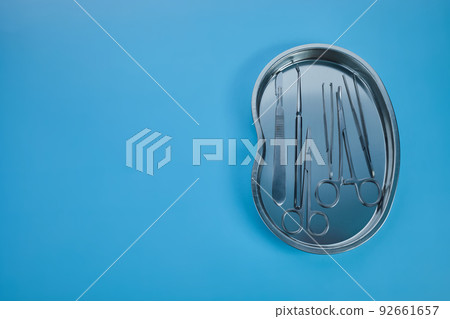 surgical equipment at surgery desk. Medical tools such scissors, scalpel. surgical equipment at surgery desk. Medical tools such scissors, scalpel. 92661657