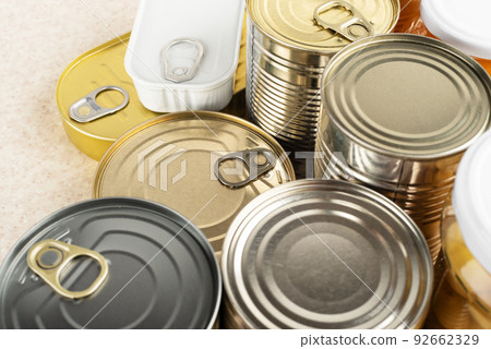 Tin cans on kitchen table background with copy space 92662329