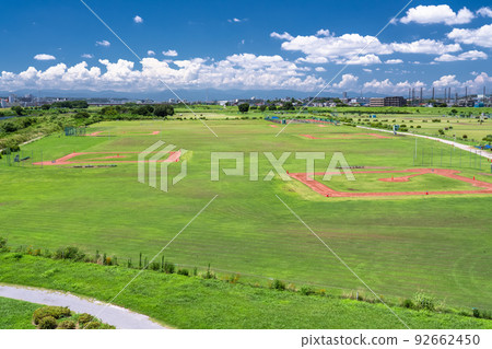 "Tokyo" Blue sky and white clouds, scenery of residential area and Tama River riverbed 92662450